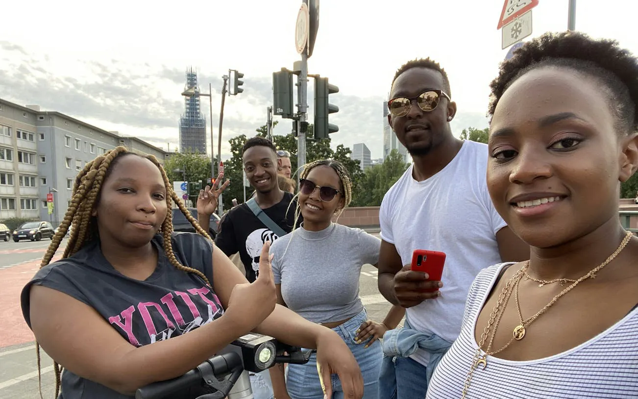 Group enjoying Old Town Frankfurt city exploration game.