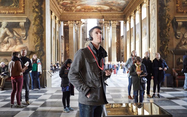 Visitors exploring the Painted Hall at the Old Royal Naval College, Greenwich.