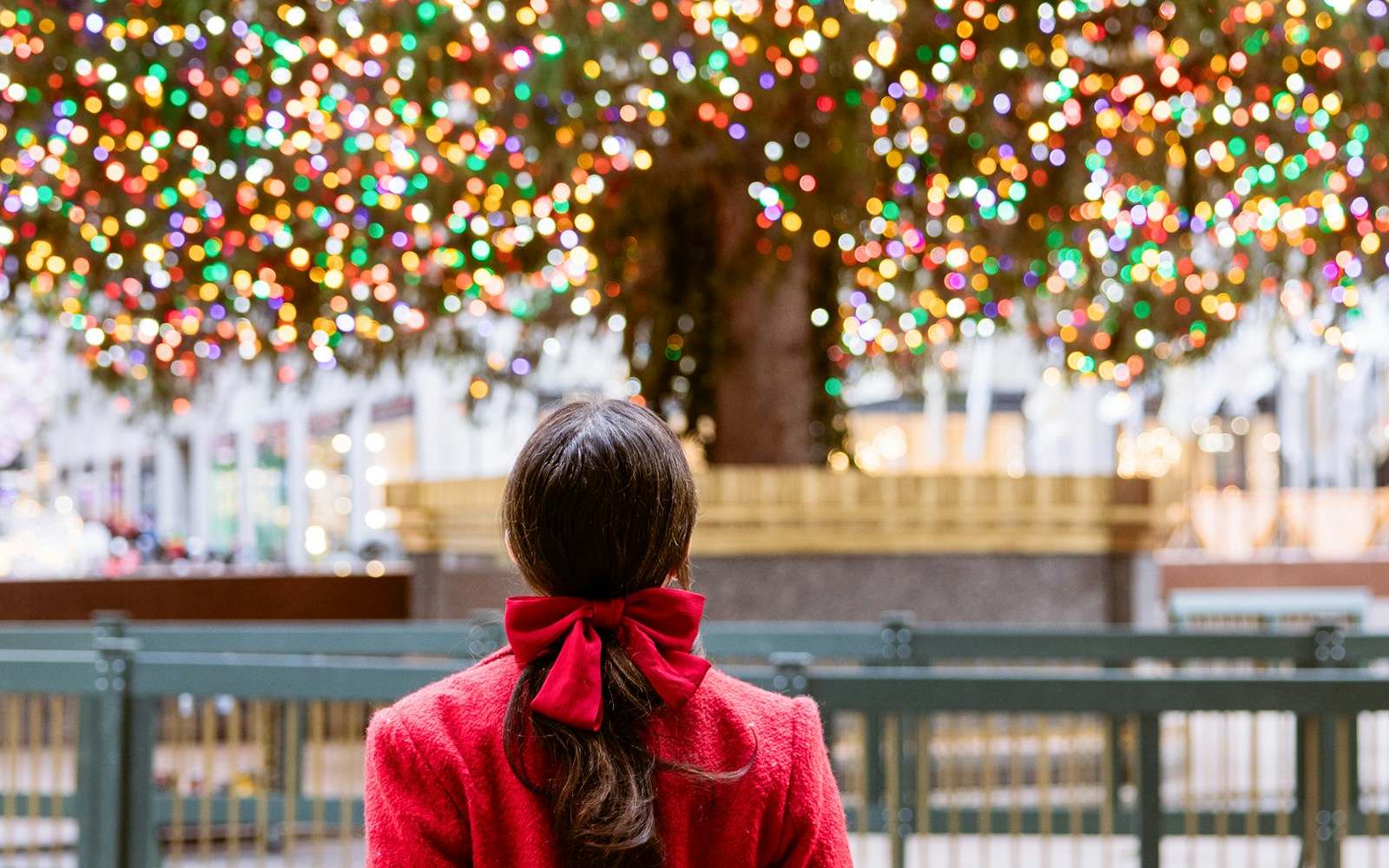 Rockefeller Center holiday lights with Top of the Rock view, New York City.