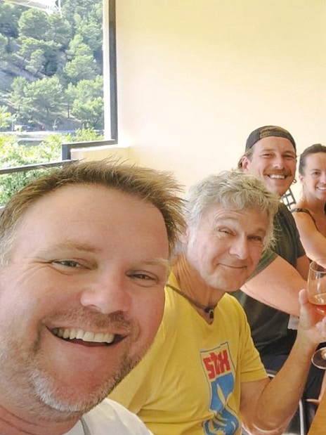 Guests enjoying wine tasting during Krka National Park day trip.