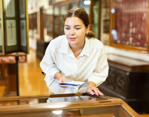 Ancient artifacts display at a museum in a historical setting.