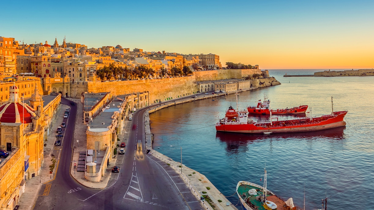The Grand Harbour Malta with historic fortifications and docked boats.