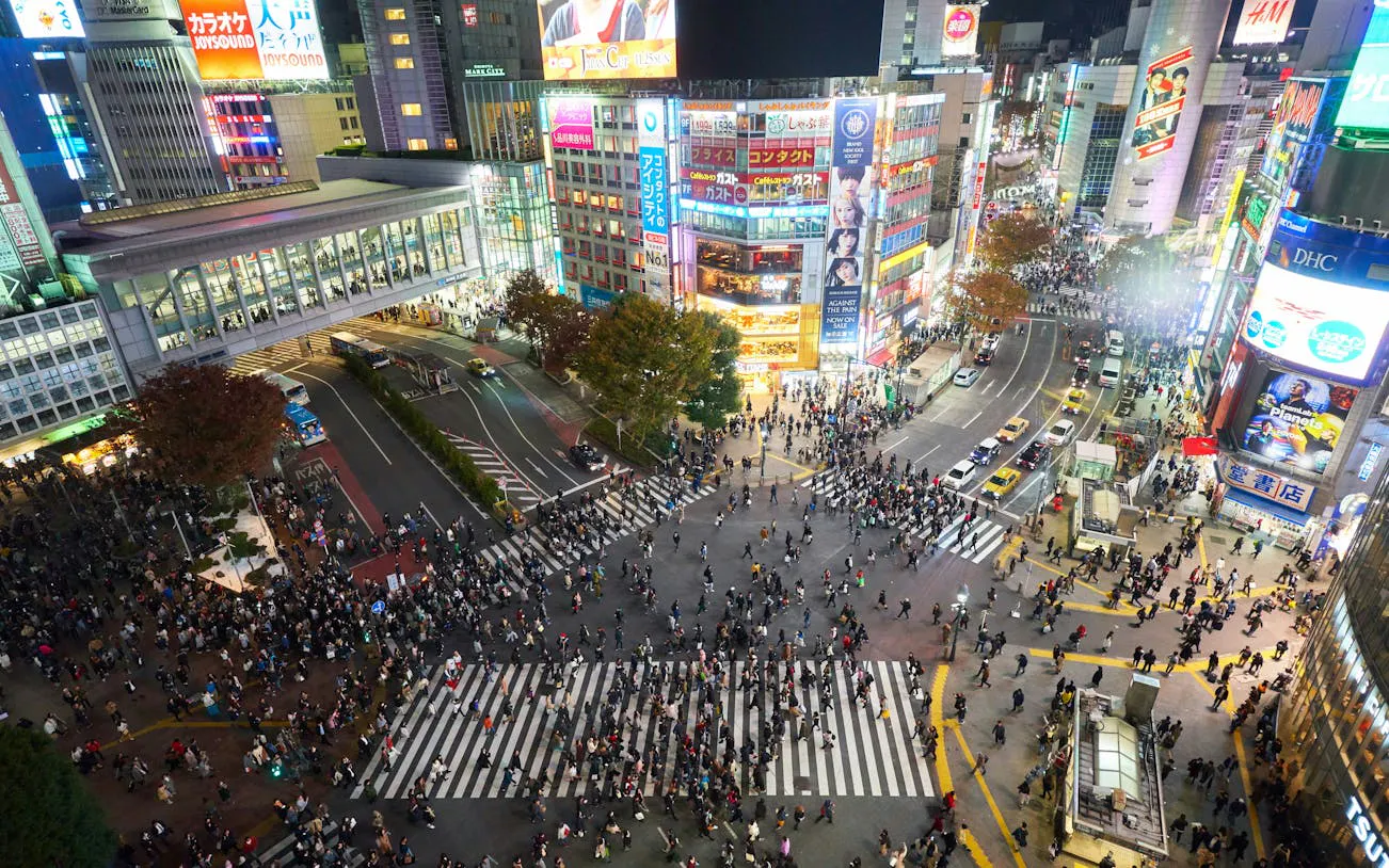 Crowds at Shibuya Crossing in Tokyo during the Shibuya Sky, Cat Street, and Meiji Shrine tour.