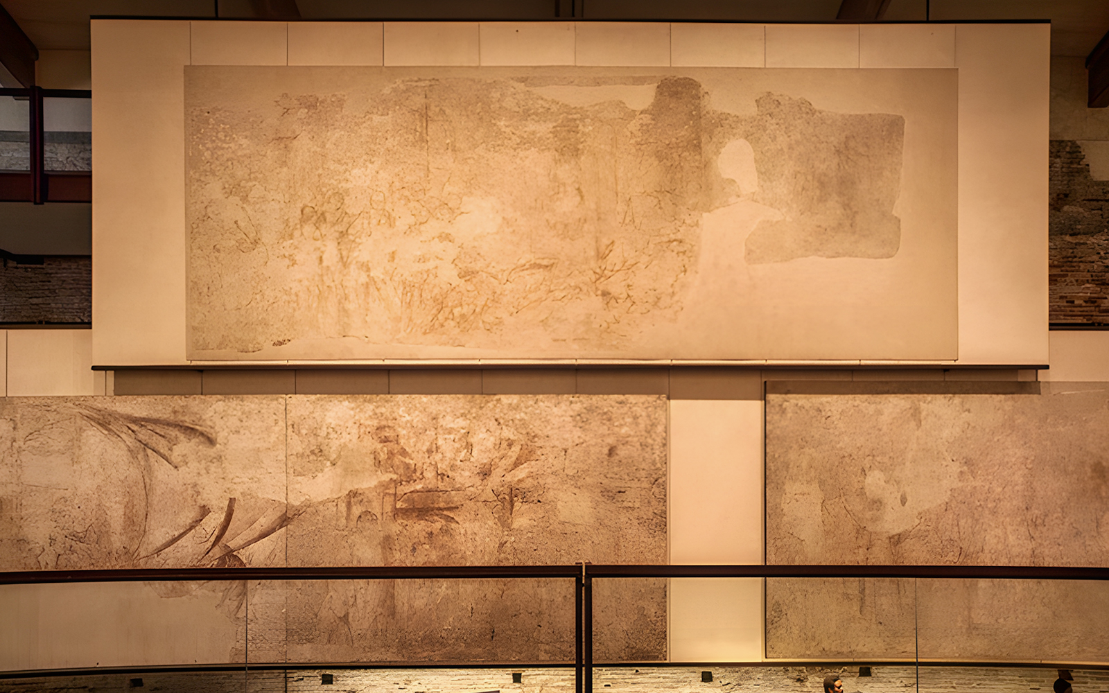 Paintings on display at Sinopie Museum, Pisa, showcasing historical fresco sketches.
