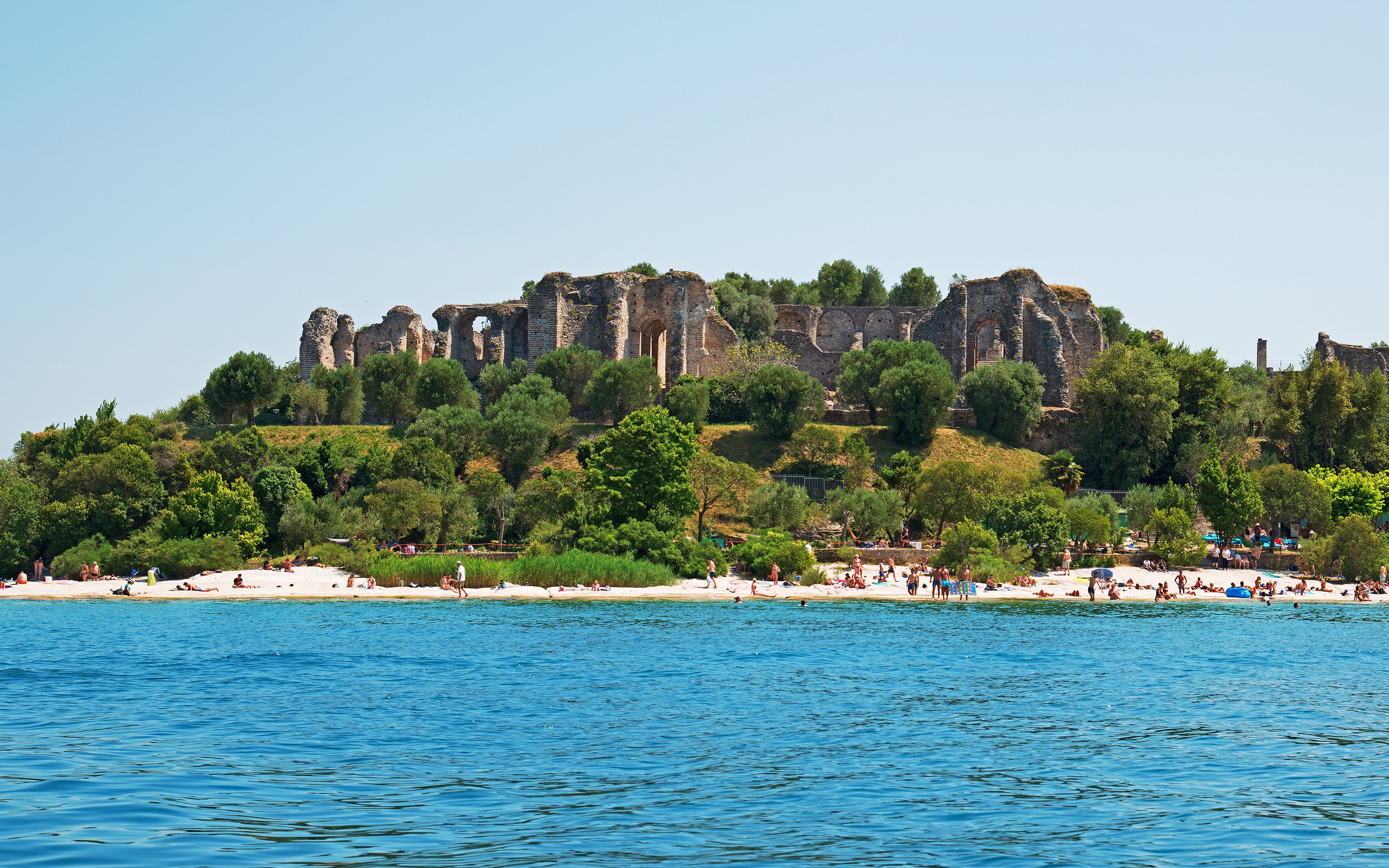 Ruins of Grotto of Catullus on Lake Garda shoreline, Sirmione, Italy.