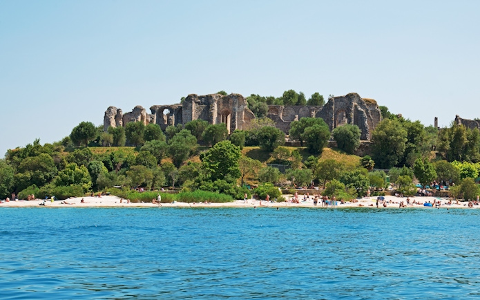 Ruins of Grotto of Catullus on Lake Garda shoreline, Sirmione, Italy.