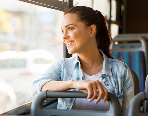 Woman on the bus looking outside