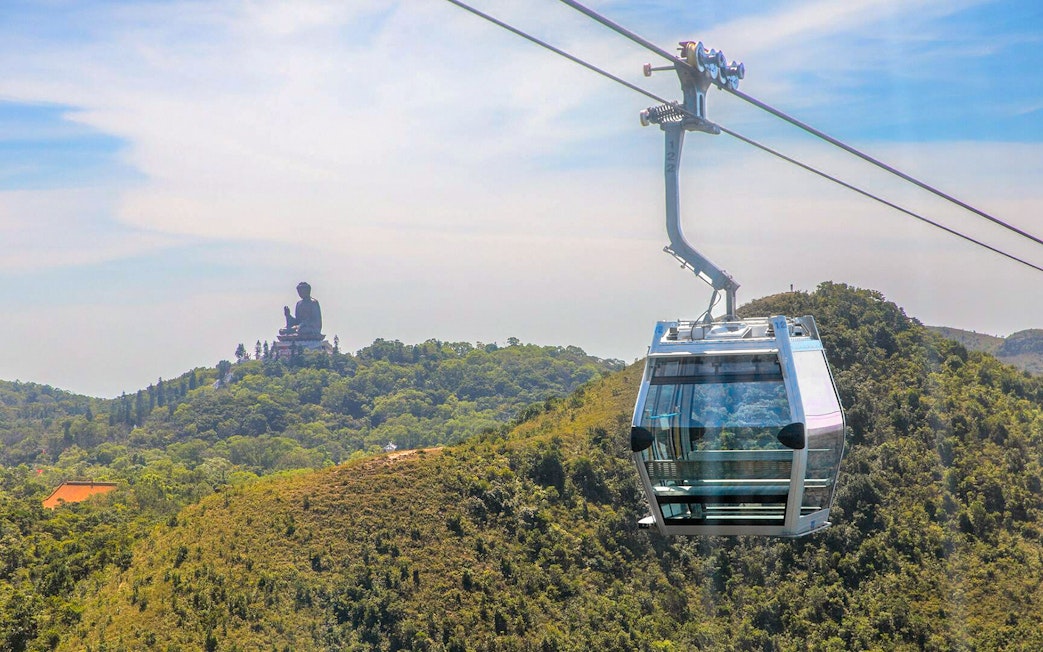 Nong Ping Crystal Plus Cabin with Tian Tan Buddha view in Hong Kong.