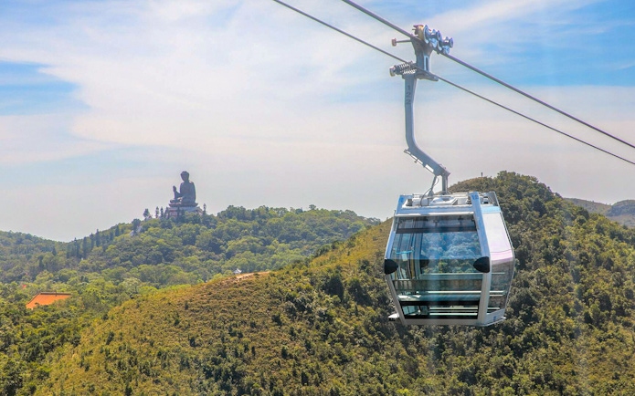 Nong Ping Crystal Plus Cabin with Tian Tan Buddha view in Hong Kong.