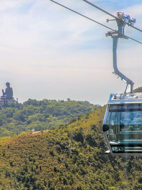 Nong Ping Crystal Plus Cabin with Tian Tan Buddha view in Hong Kong.