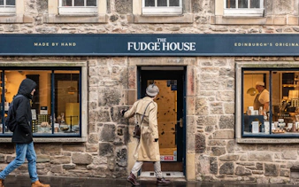 Visitor entering The Fudge House on Edinburgh Historical Gems Tour.