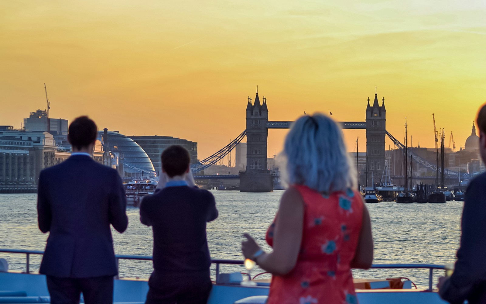  Guests enjoying the sunset on the Thames