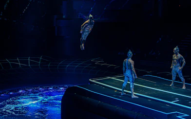 Acrobats performing a high dive at La Perle show in Dubai.