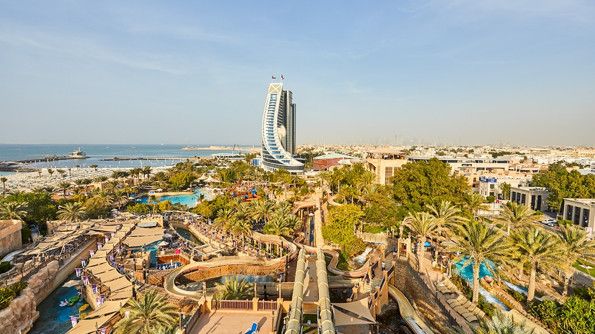 Burj Khalifa view with Wild Wadi Waterpark, includes café pastry and coffee offer.