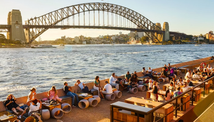 House Canteen patrons dining with Sydney Harbour Bridge view.