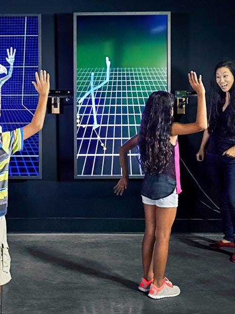 Visitors engaging with motion capture exhibits at Warner Bros Studio Tour Hollywood.