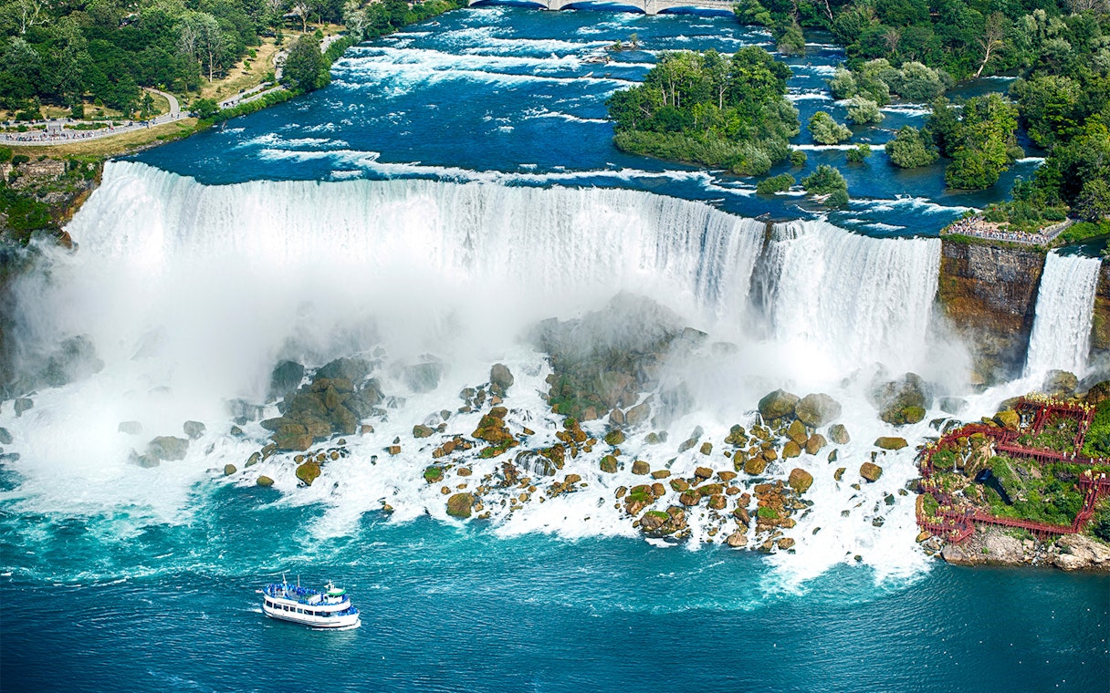 Bridal Veil Falls at Table Rock with tour boat on Niagara River.