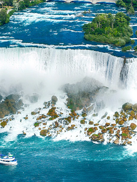 Bridal Veil Falls at Table Rock with tour boat on Niagara River.
