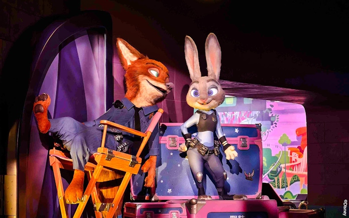 Animated characters in police uniforms at Zootopia: Hot Pursuit attraction.