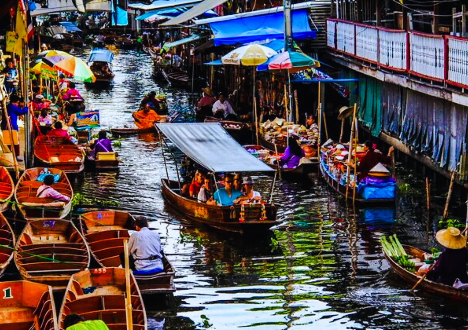 From Bangkok: Damnoen Saduak Floating Market and Maeklong Railway Market Private Van Charter Image 4