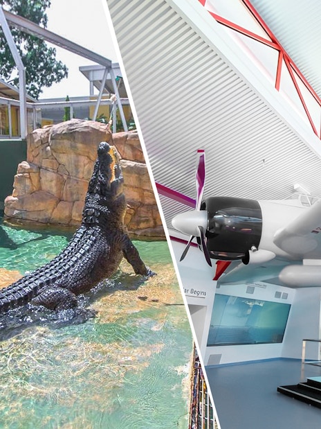 Crocodile in water at Crocosaurus Cove, Darwin, and a historic aircraft display indoors.