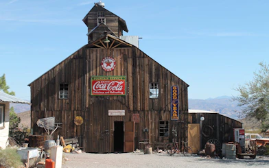 El Dorado Canyon Ghost Town wooden building with vintage signs, Las Vegas day tour.