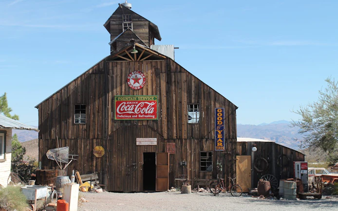 El Dorado Canyon Ghost Town wooden building with vintage signs, Las Vegas day tour.