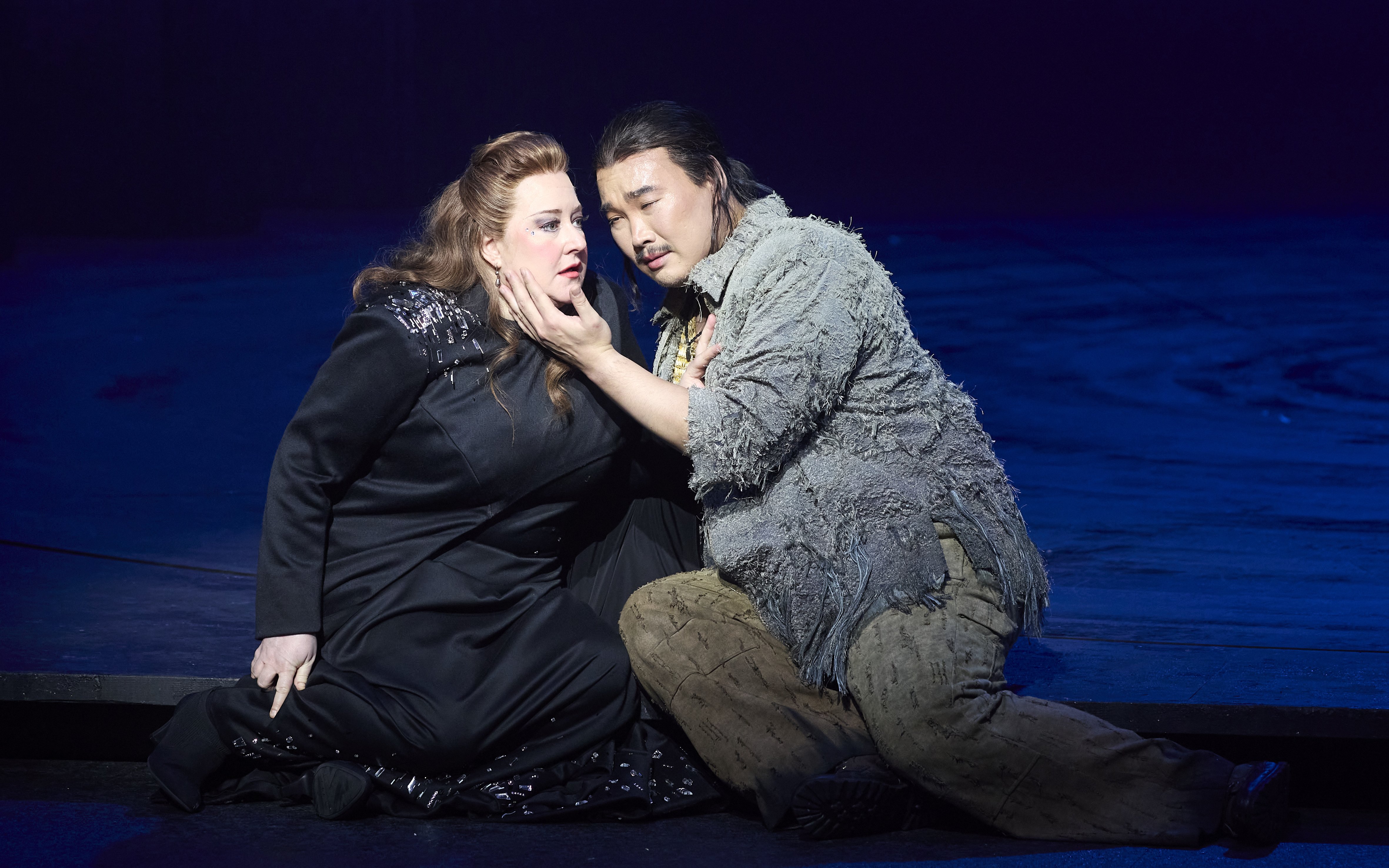 Stage scene from Turandot opera in Sydney with two performers in dramatic pose.