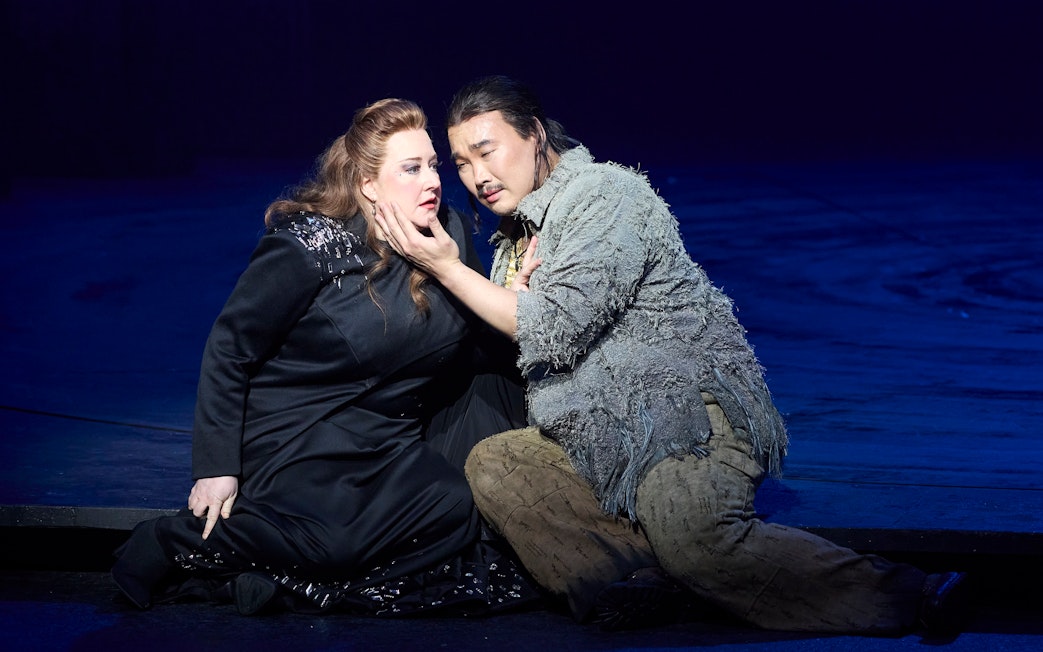 Stage scene from Turandot opera in Sydney with two performers in dramatic pose.