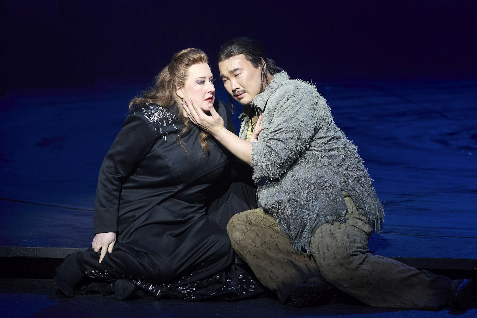 Stage scene from Turandot opera in Sydney with two performers in dramatic pose.
