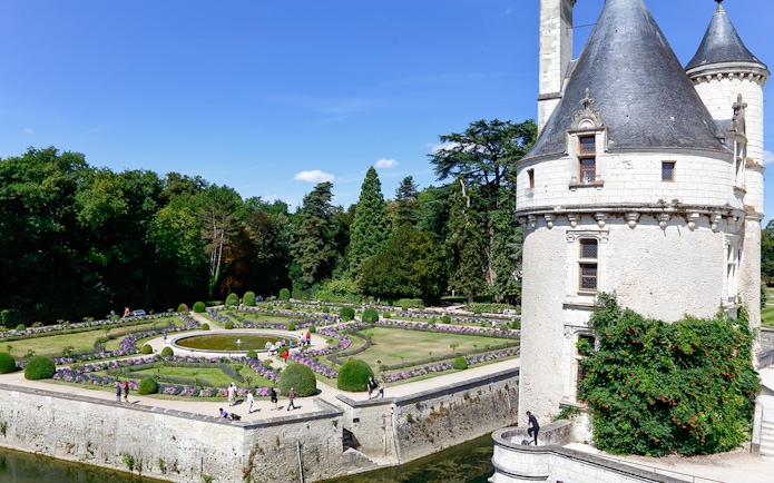 Chaumont-sur-Loire Castle exterior with gardens and visitors in France.