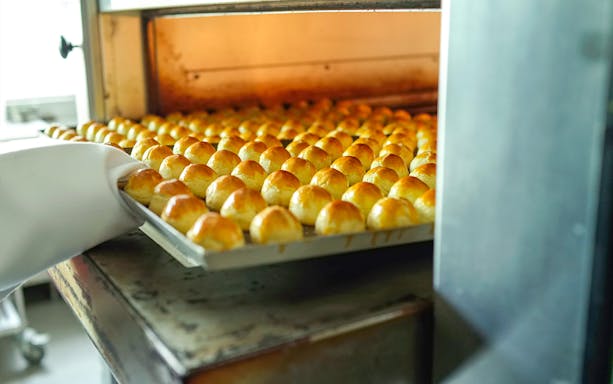 Baking KELE Singapore pineapple tarts in an oven.