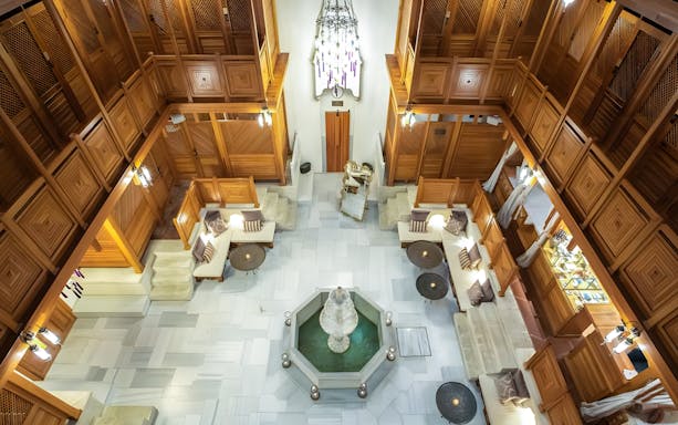 Hürrem Sultan Luxury Hamam interior with central fountain and seating, near Hagia Sophia.