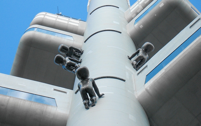 Žižkov Television Tower in Prague with crawling baby sculptures.