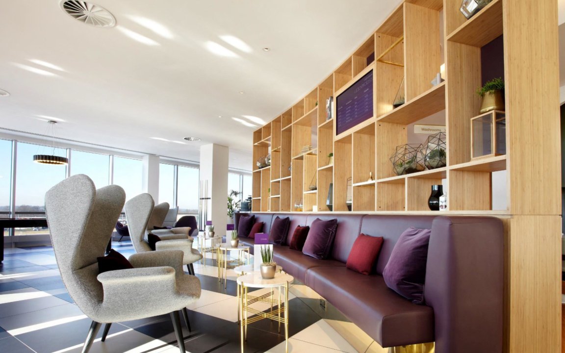 Plaza Premium Lounge seating area with modern decor at London Gatwick Airport North Terminal.