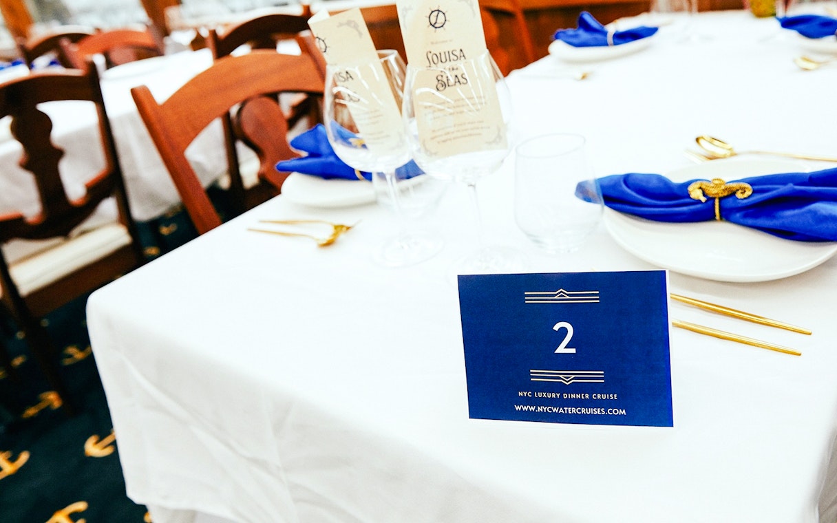 Elegant table setting for New Year's Eve Dinner Cruise in NYC.