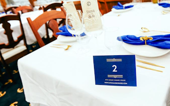 Elegant table setting for New Year's Eve Dinner Cruise in NYC.