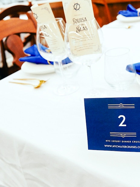 Elegant table setting for New Year's Eve Dinner Cruise in NYC.