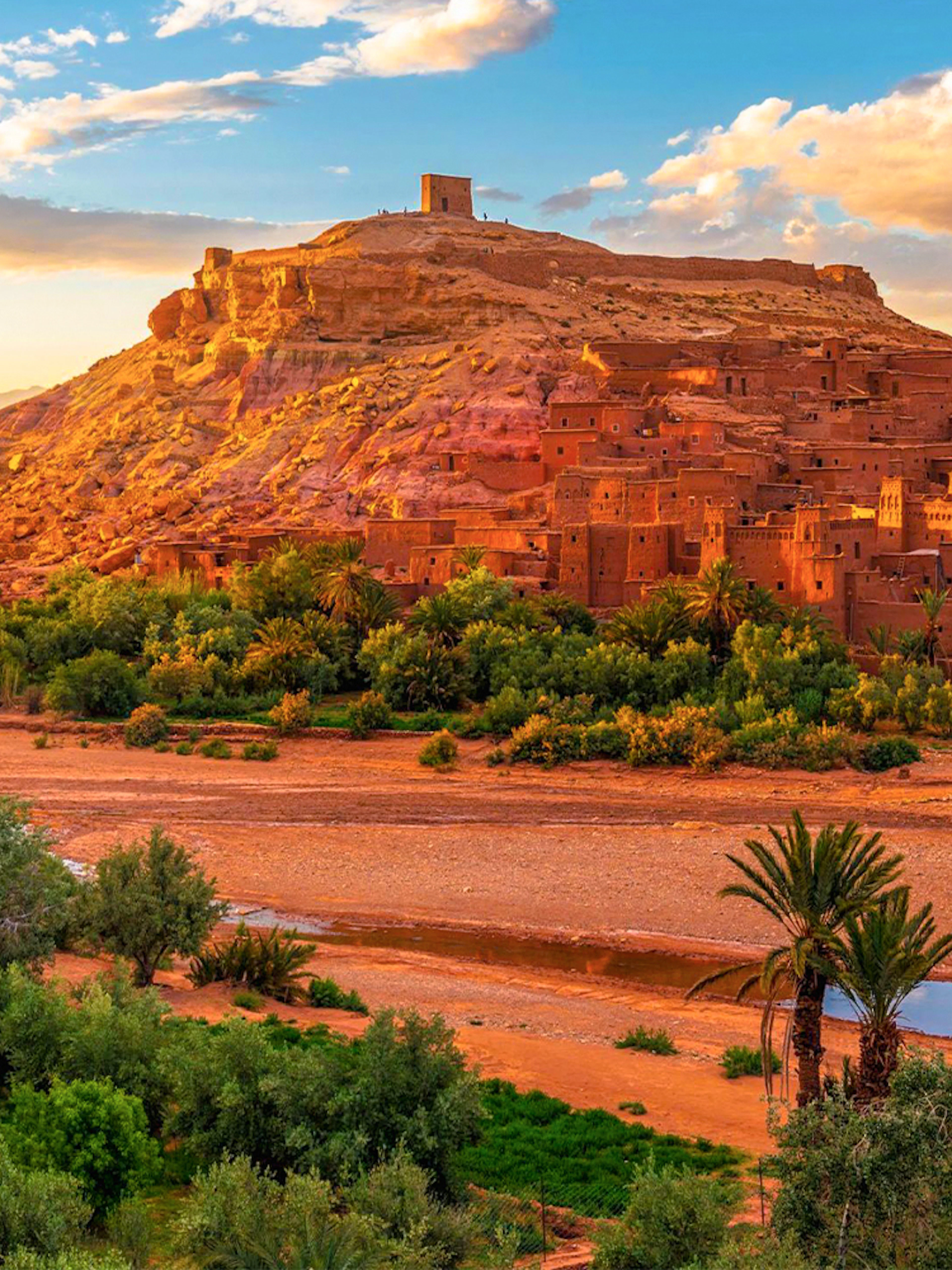 Ait Benhaddou kasbah with surrounding landscape on a day trip from Marrakech to Ouarzazate.
