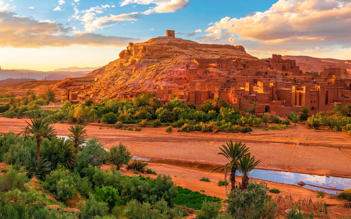 Ait Benhaddou kasbah with surrounding landscape on a day trip from Marrakech to Ouarzazate.