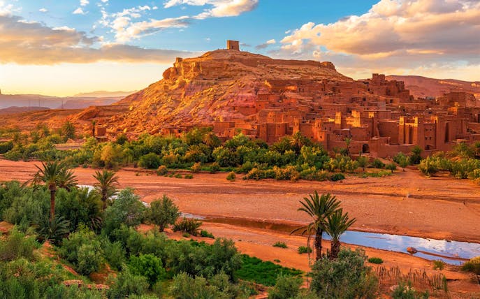 Ait Benhaddou kasbah with surrounding landscape on a day trip from Marrakech to Ouarzazate.