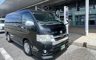 Van parked at Kansai Airport Terminal 1 for Osaka City private transfer.