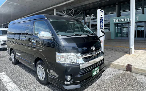 Van parked at Kansai Airport Terminal 1 for Osaka City private transfer.
