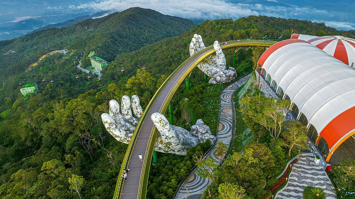 Aerial view of Golden Bridge with giant hands at Sun World Ba Na Hills, Da Nang, Vietnam.