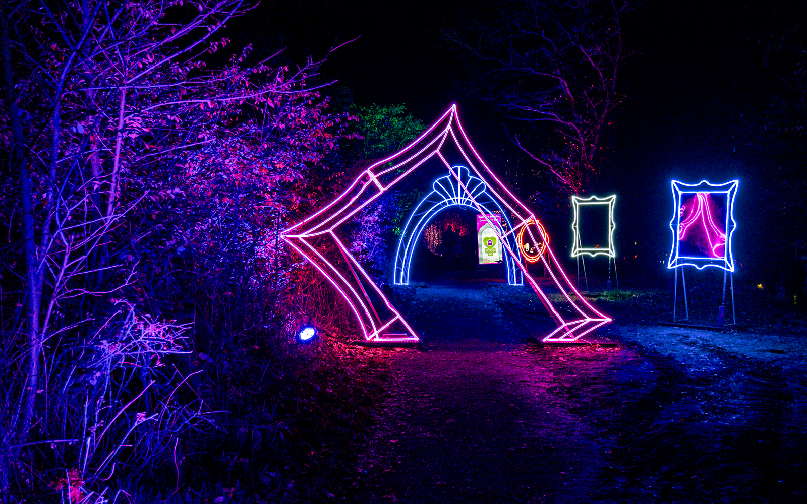 Neon light installations at Lumina Park Wonderworld pathway.
