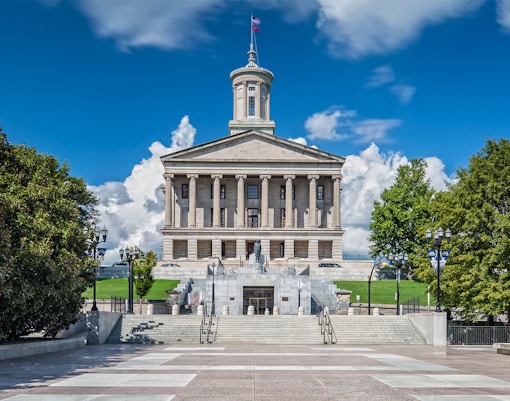 HOHO Bus pasing through Tennessee State Capitol in Nashville.