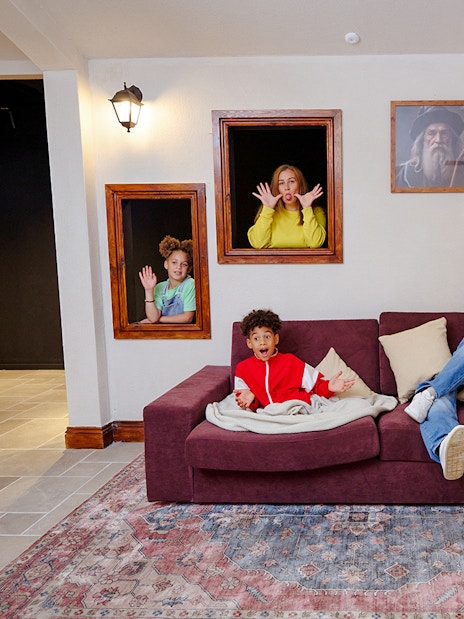 Guests interacting with optical illusions at Paradox Museum London.