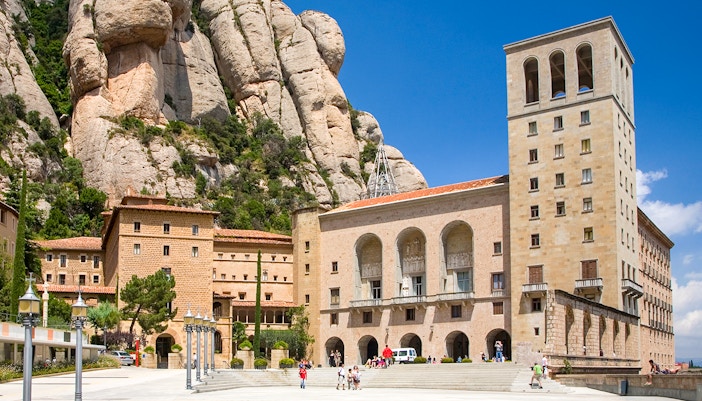 Montserrat Monastery with rocky mountain backdrop in Catalonia, Spain.