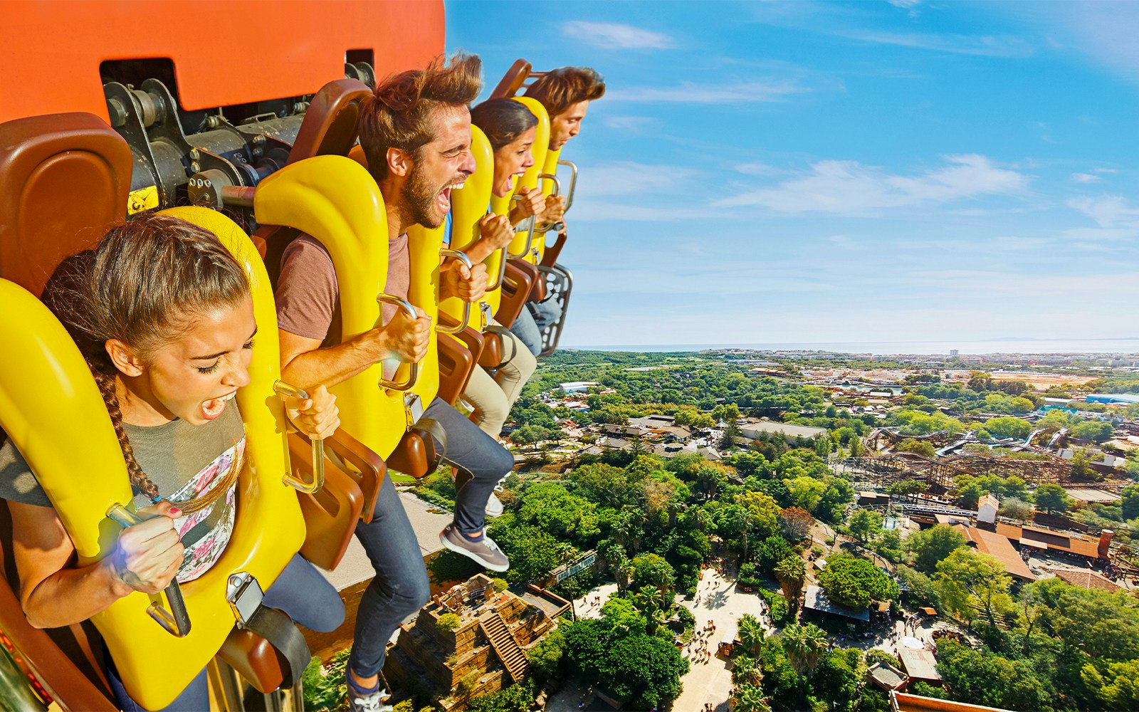 Hurakan Condor ride at PortAventura with thrill-seekers experiencing a vertical drop.