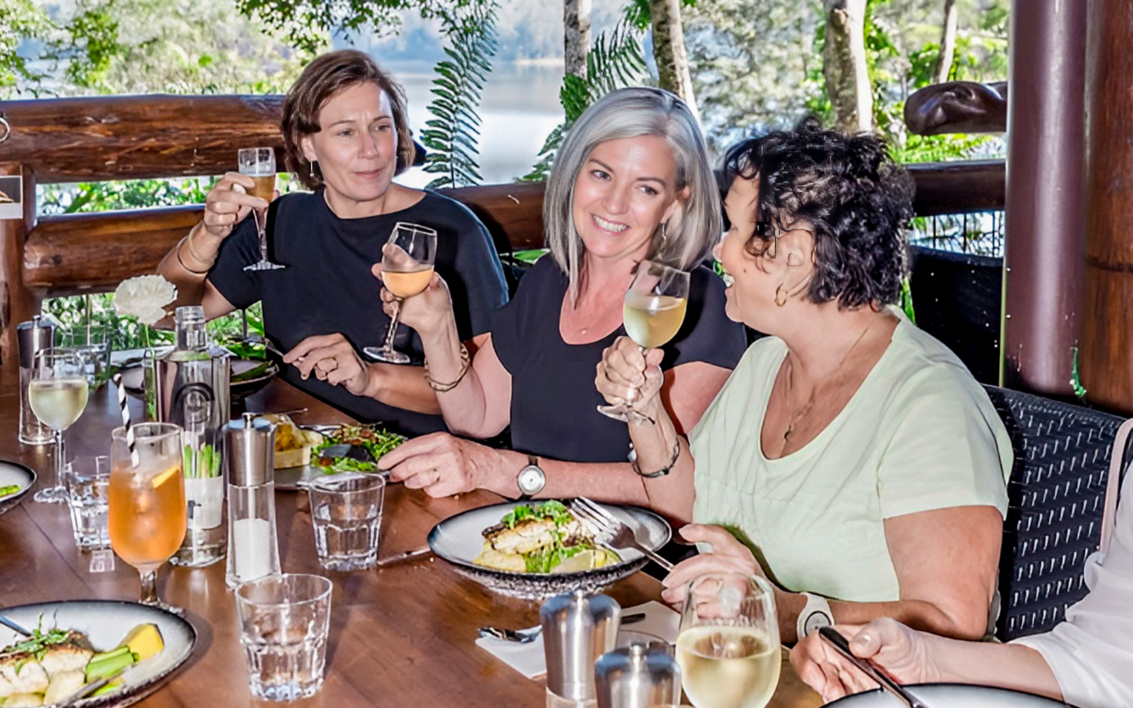 Guests enjoying wine and lunch on a guided tour at Sunshine Coast Hinterland.